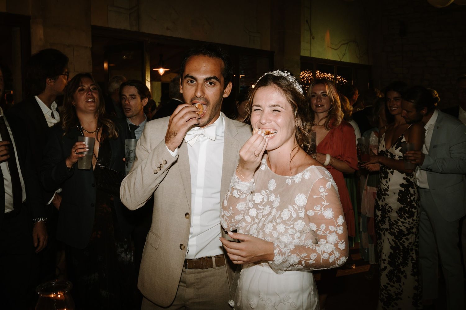 Wedding celebration with sparklers creating a magical nighttime atmosphere.