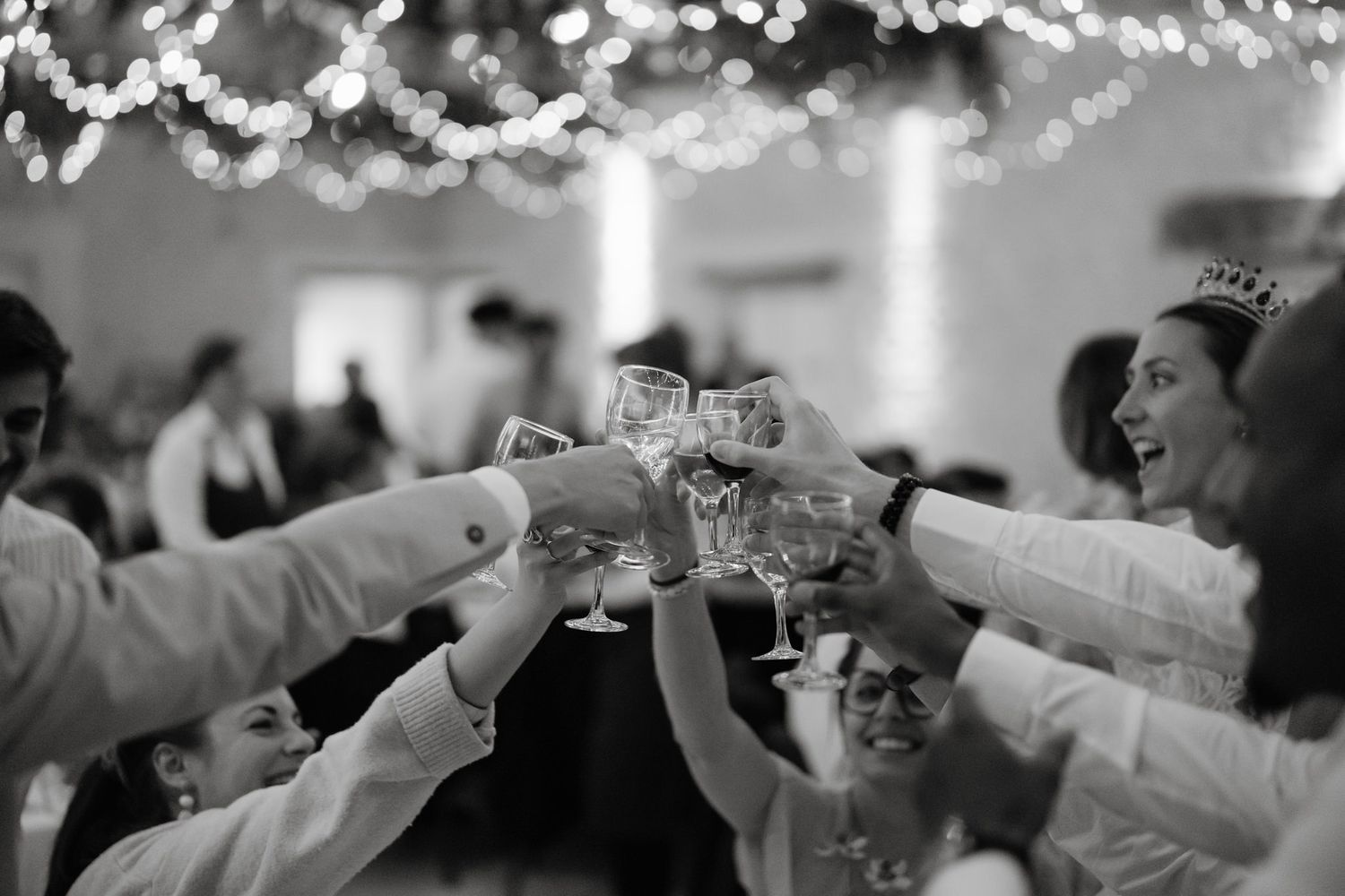 Wedding celebration with bokeh lights creating a magical atmosphere.
