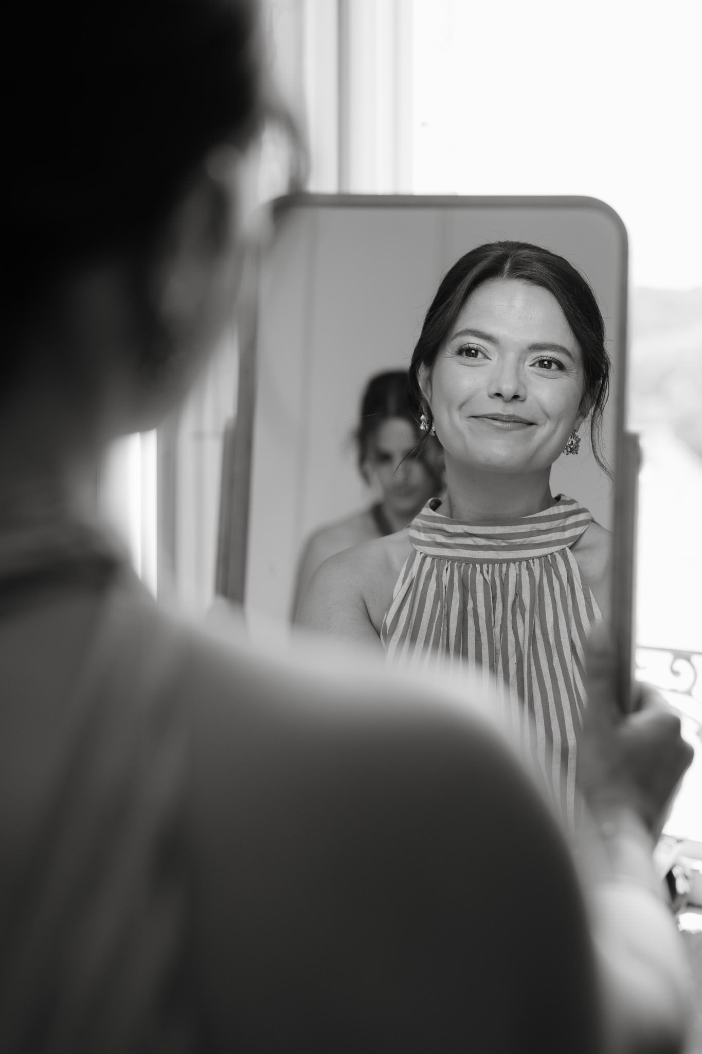 Black and white reflective mirror shots showing gentle expressions.