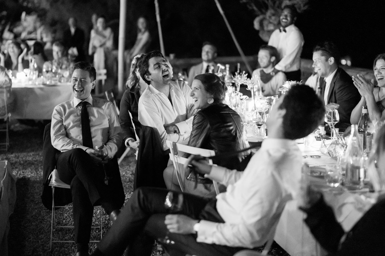 Wedding celebration with guests dancing and enjoying the evening festivities.