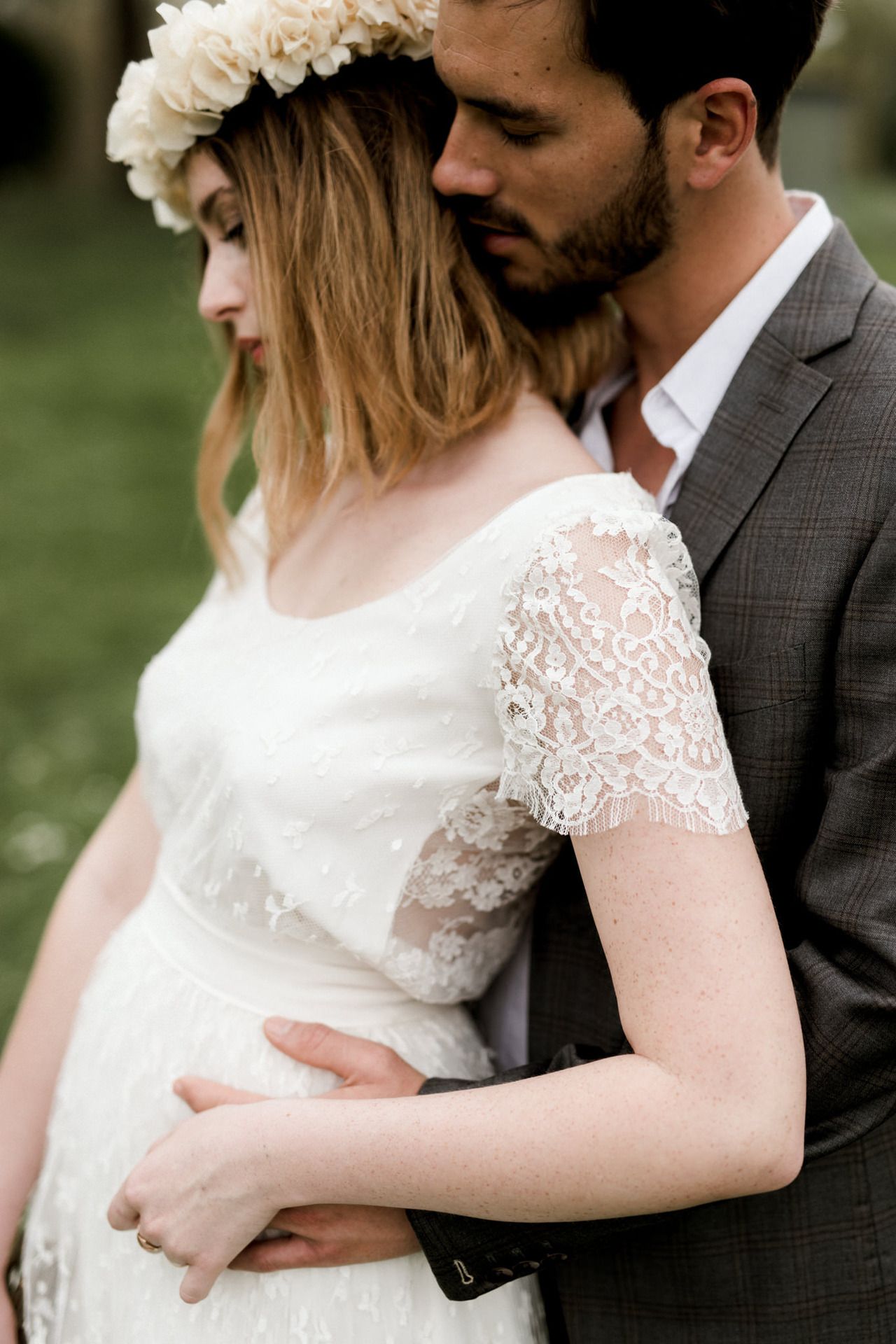 A series of intimate wedding photos showing tender moments between newlyweds in formal attire.