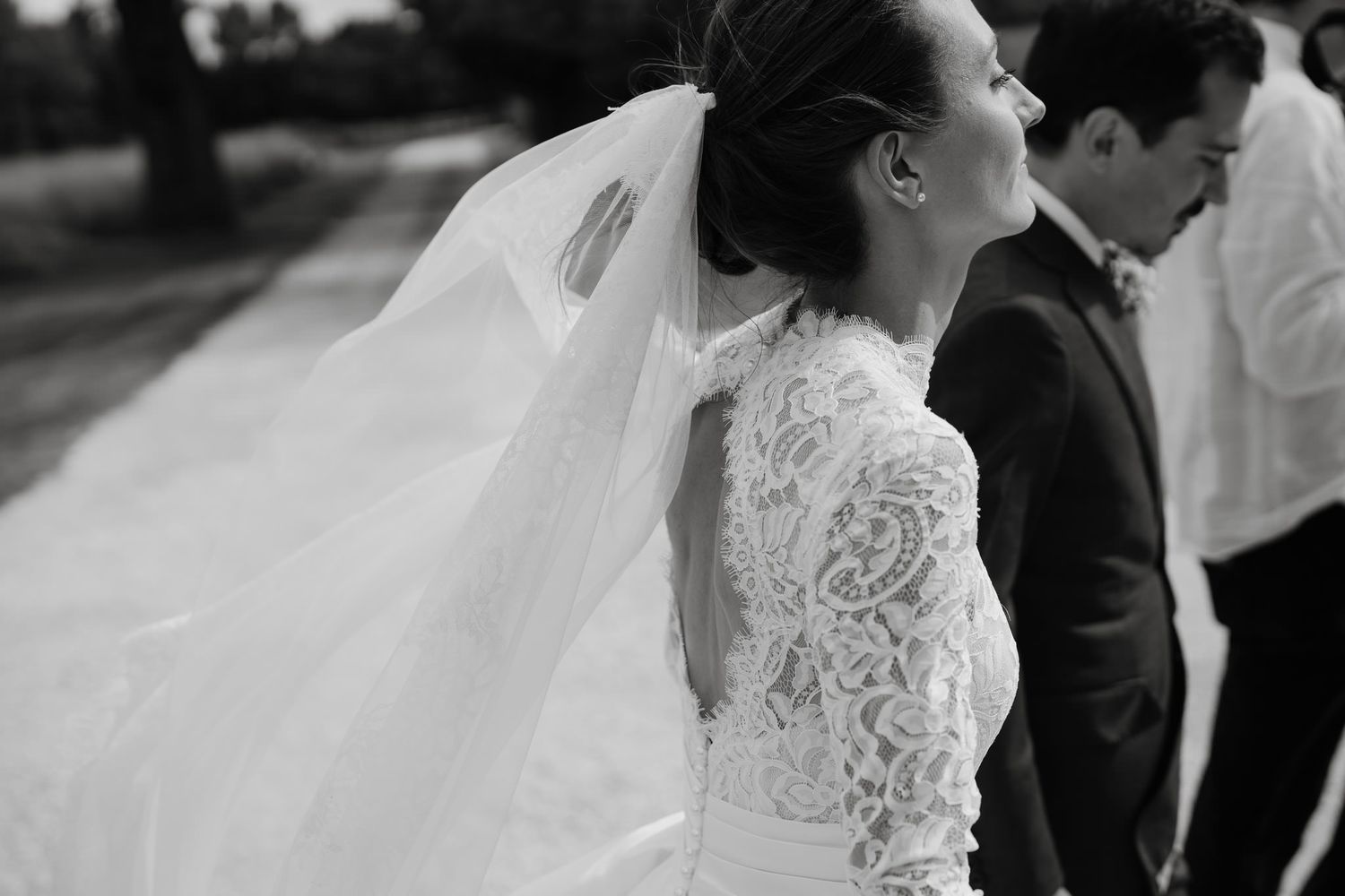 Romantic black and white portrait of newlyweds in an intimate moment.