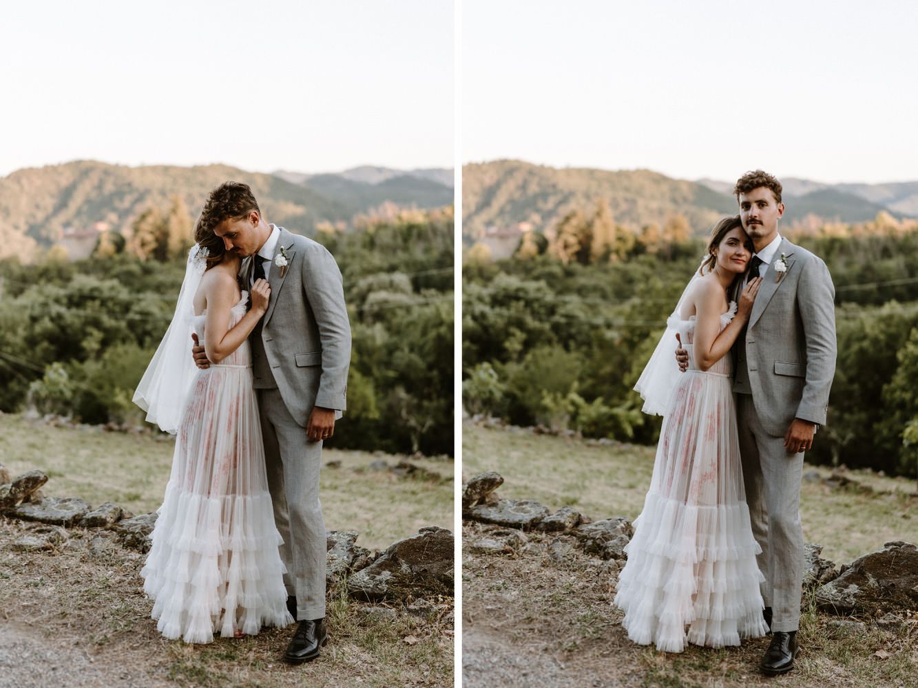 A romantic wedding couple embraces in a mountainous landscape during golden hour.