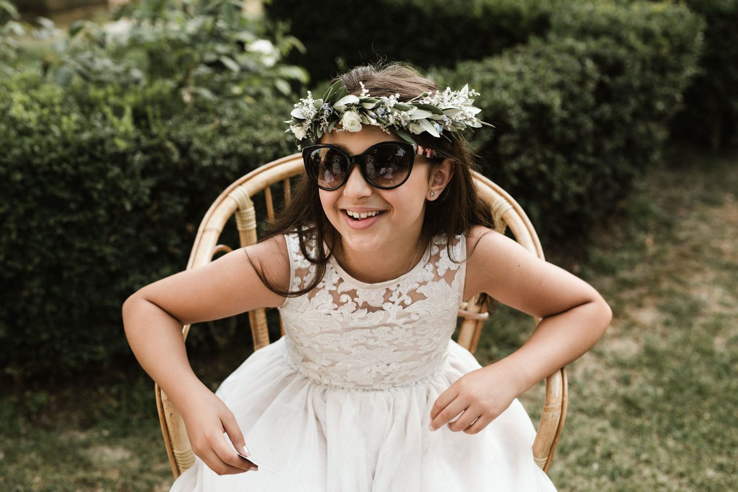 Close-up details of elegant lace wedding attire and accessories.