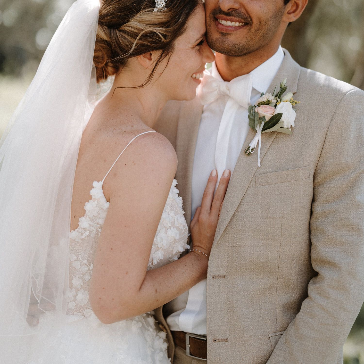 Romantic close-up wedding portraits in soft natural lighting.