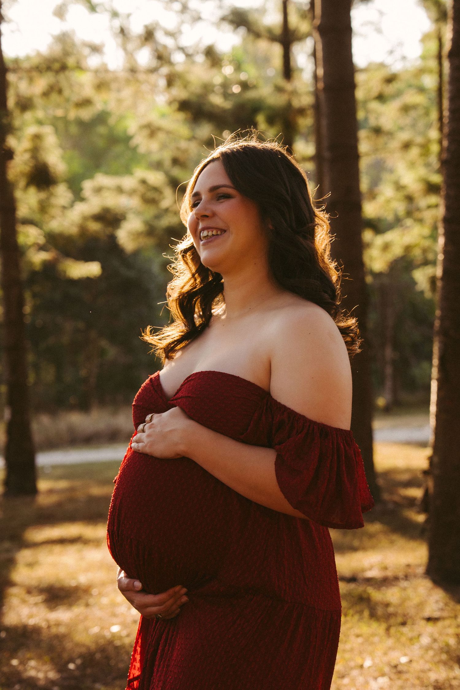 Expecting mother photographed in stunning natural setting for her maternity session