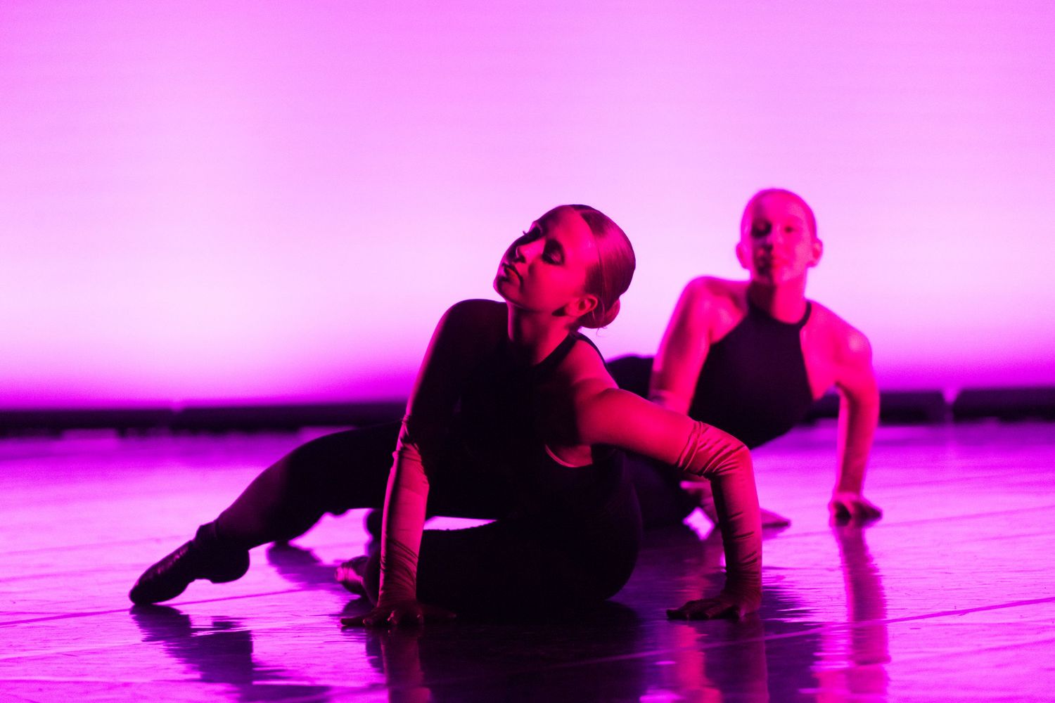 Dancer performing on stage during a dance concert