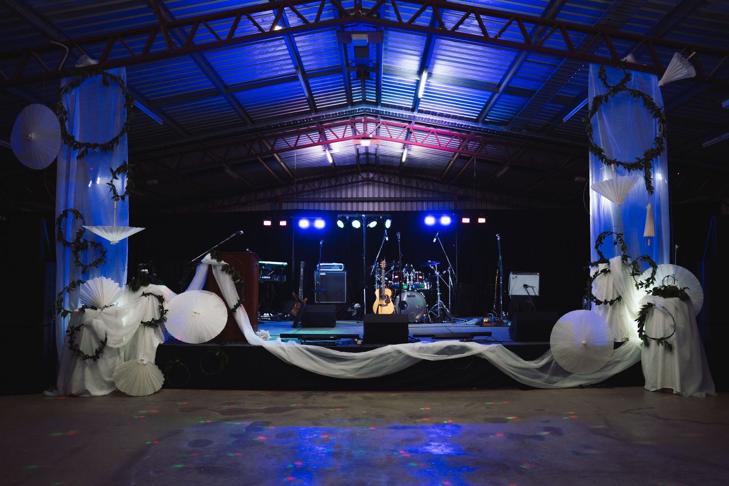Wide-angle photograph of a beautifully styled private event showcasing the venue and décor.