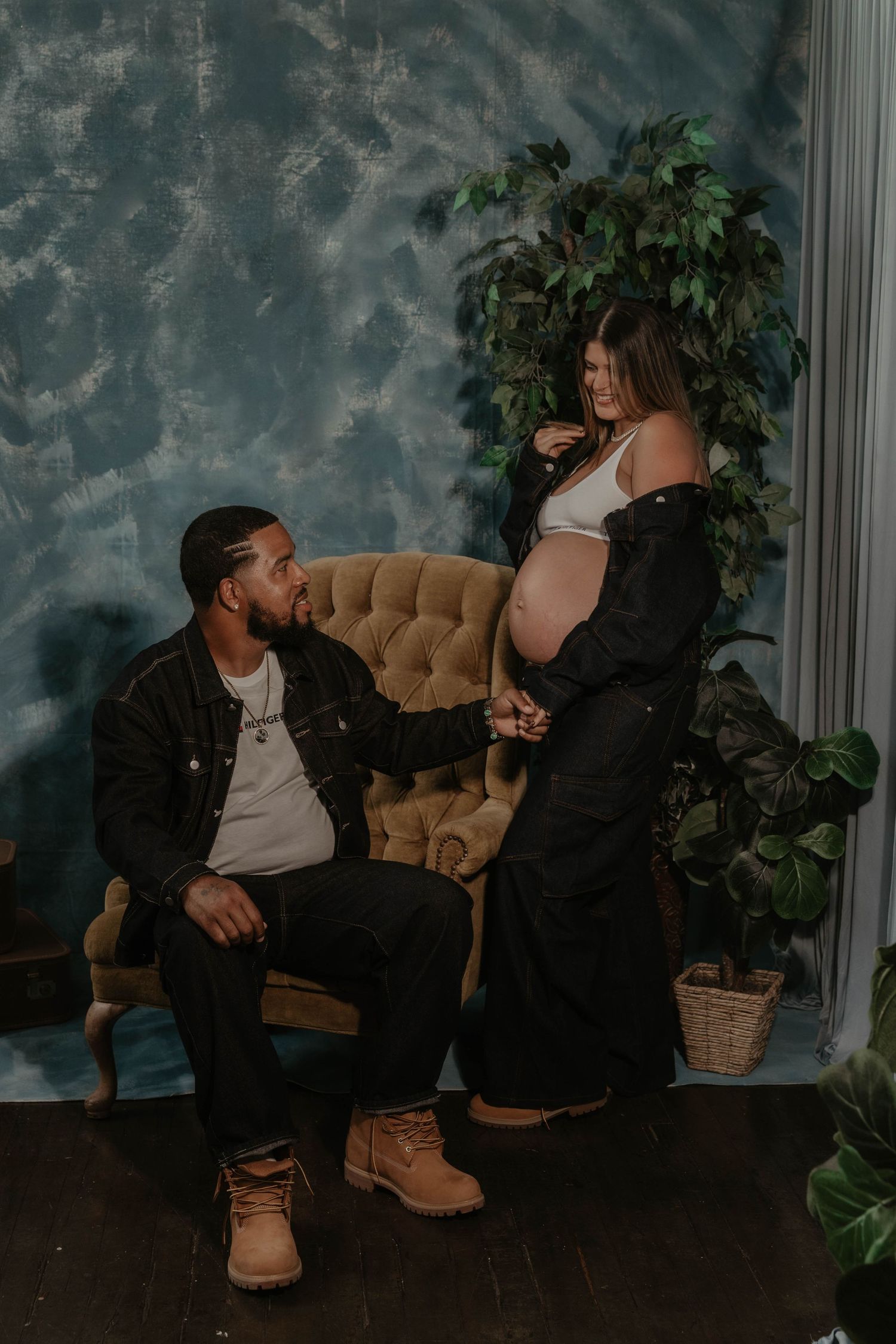 R&B inspired maternity session in Rhode Island studio featuring matching denim True to color moody maternity portrait artist Rhode Island