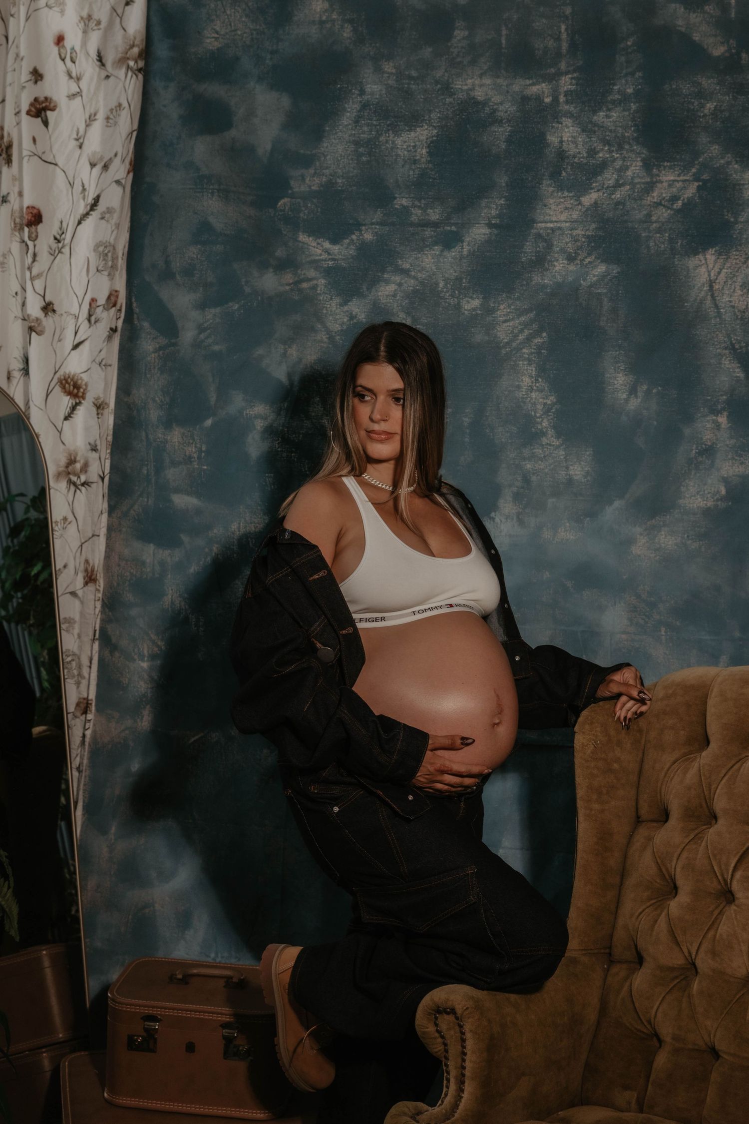 R&B inspired maternity session in Rhode Island studio featuring matching denim True to color moody maternity portrait artist Rhode Island