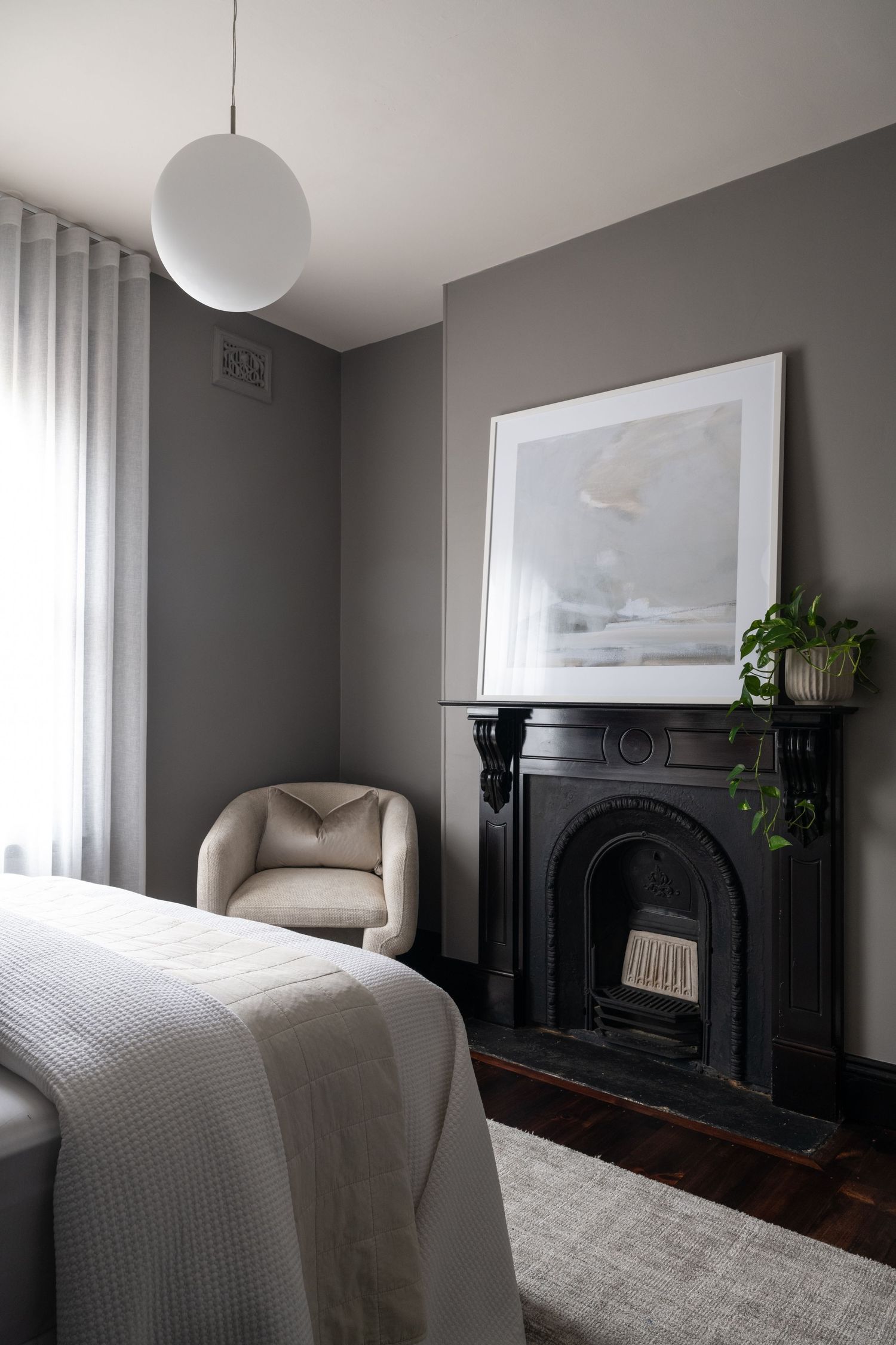 Heritage interior photography showcasing restored fireplaces, soft natural light and timeless accommodation design