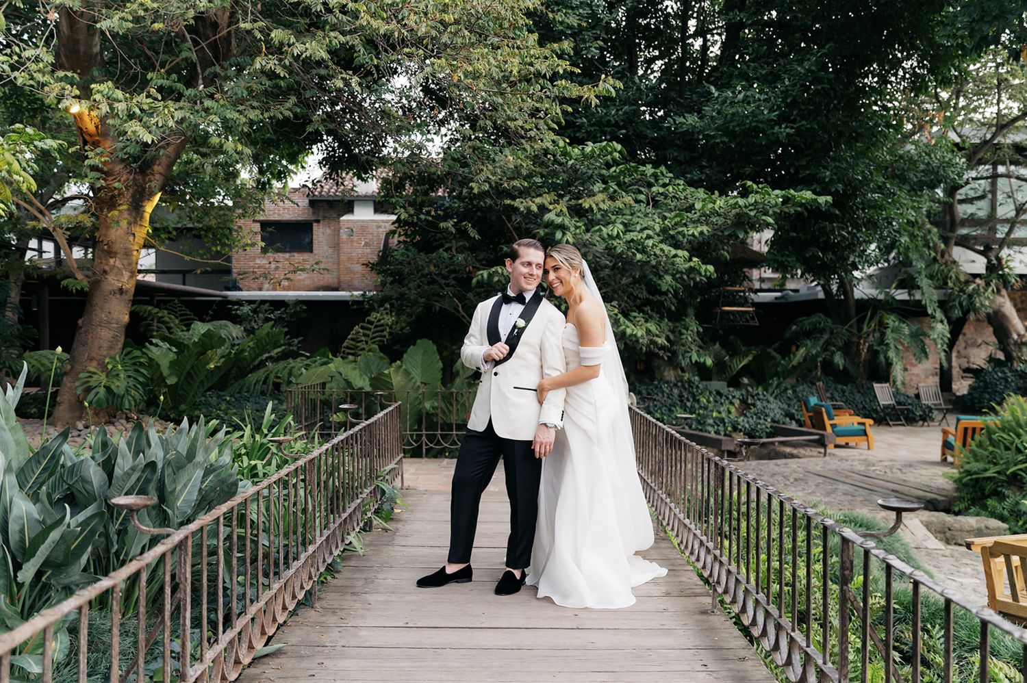 Mar and Jason walking through the historic ruins during their Casa Santo Domingo wedding in Antigua Guatemala.