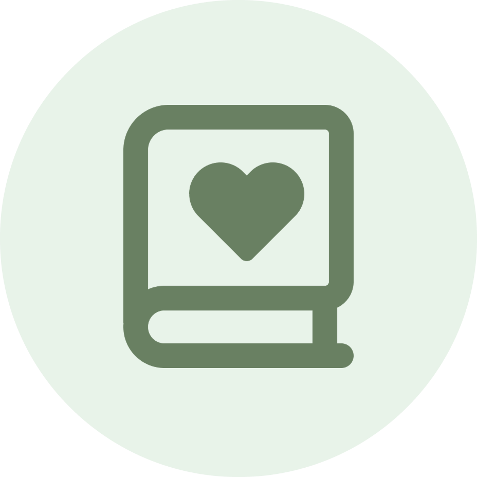 A minimalist icon of a book with a heart symbol in dark green on a light mint circular background.
