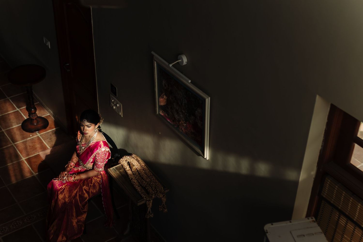 A dark and moody series of interior shots showing doorways and architectural details in low lighting conditions.