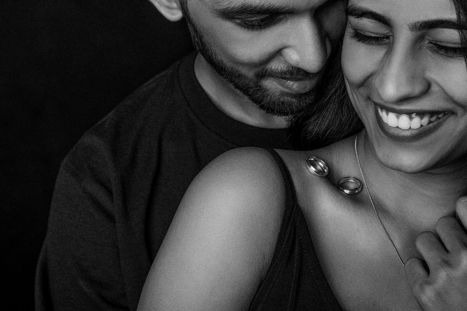 Intimate black and white close-up portraits showing genuine emotion.