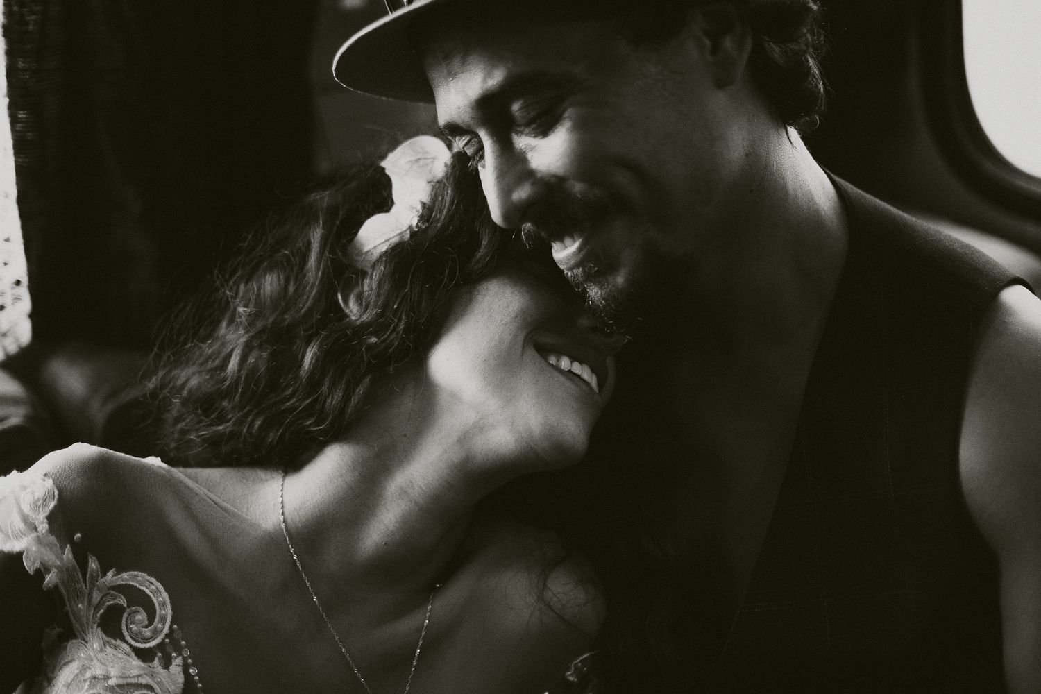 Couple's engagement moment - candid, emotional South Florida photography with warm editing