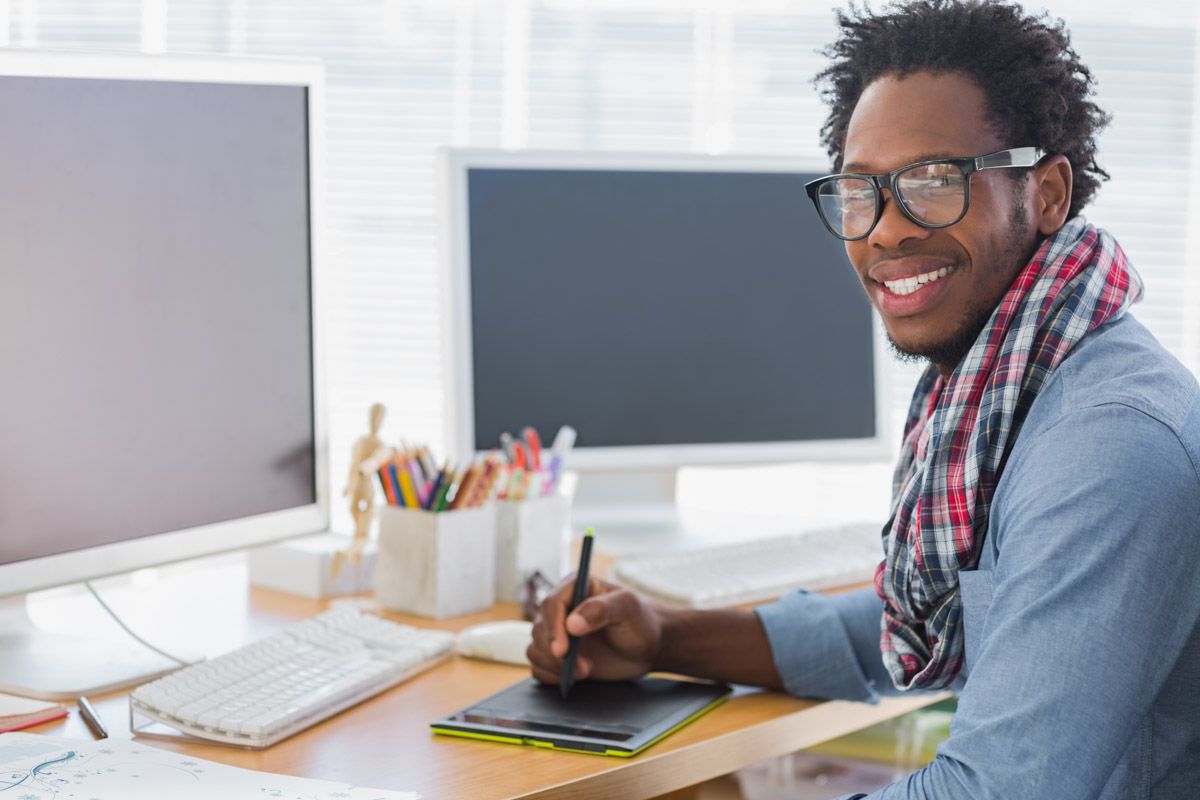 Modern business professional at desk.
