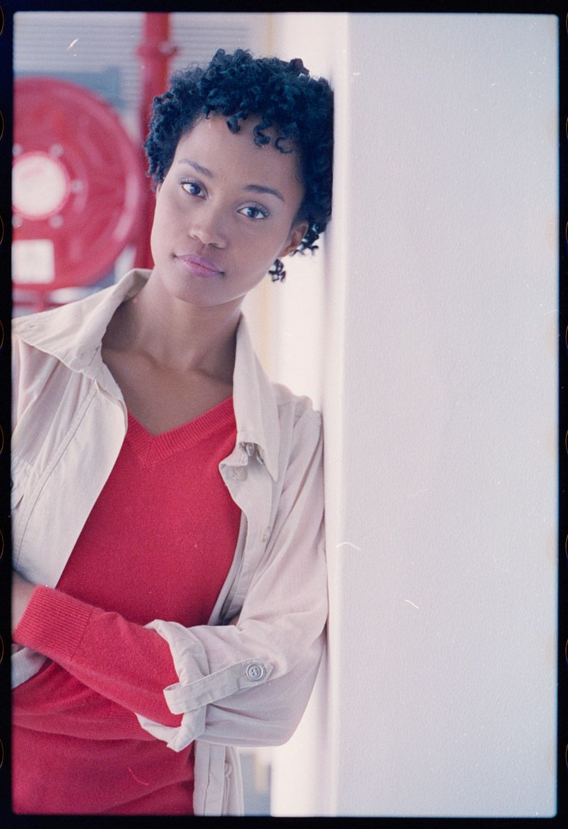 Confident young professional in studio portrait.