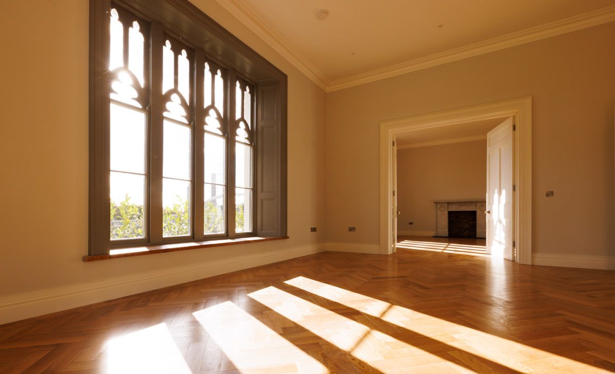 Interior wide shot of window with sunlight.