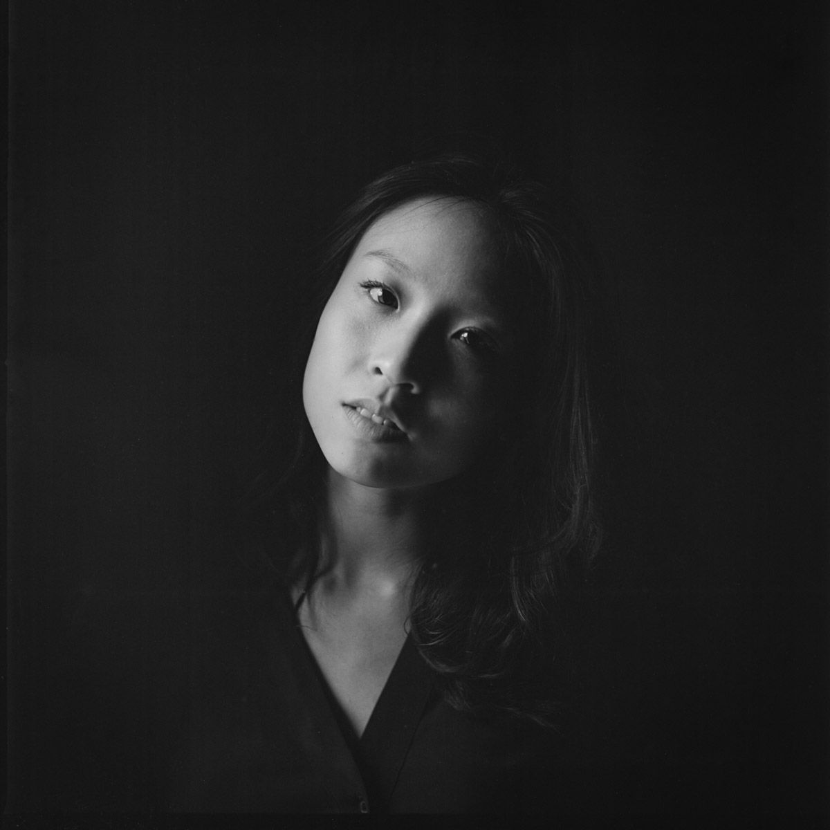 Individual portrait with soft focus and natural light.