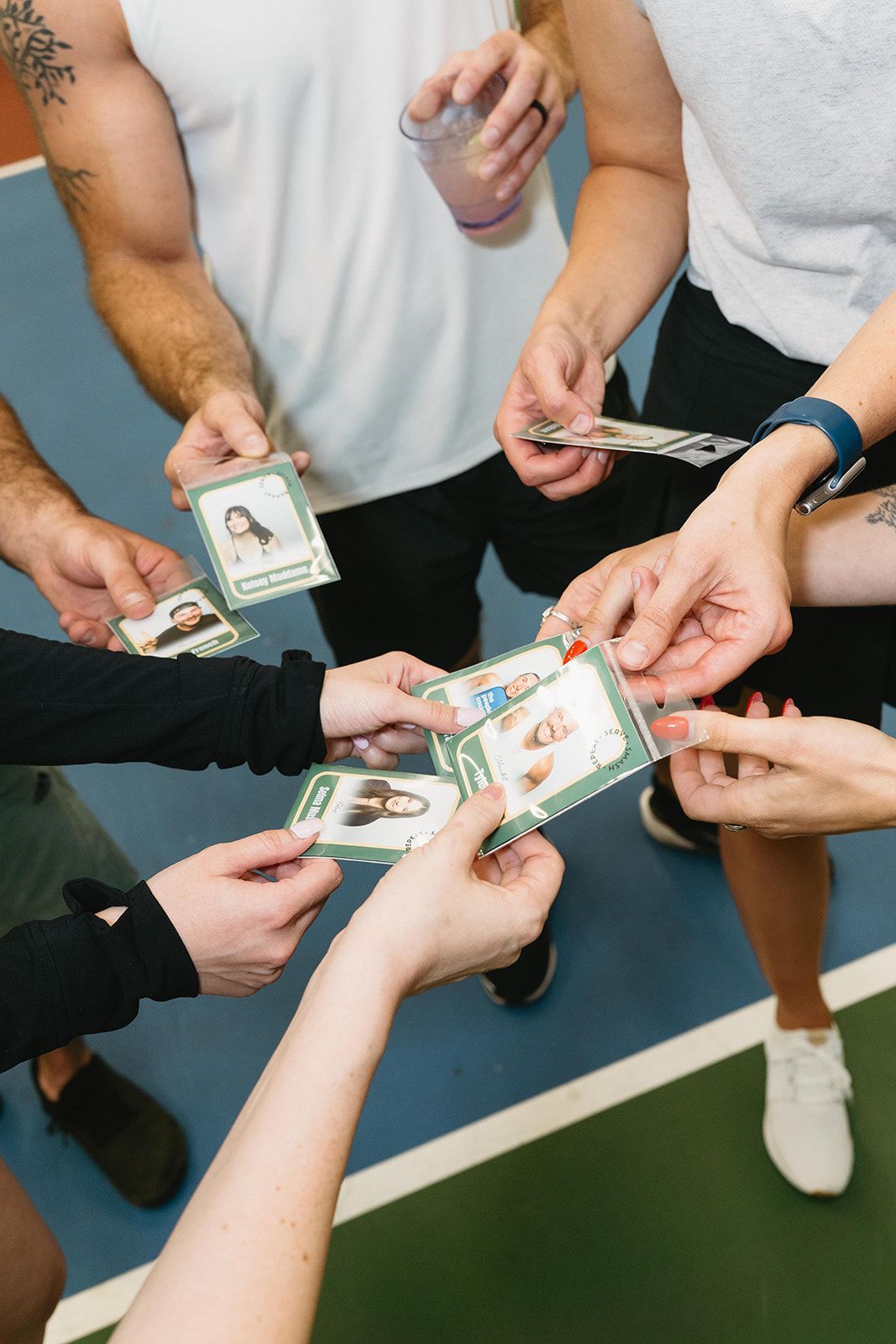 Close up of hands exchanging or counting US dollar bills during a financial transaction.