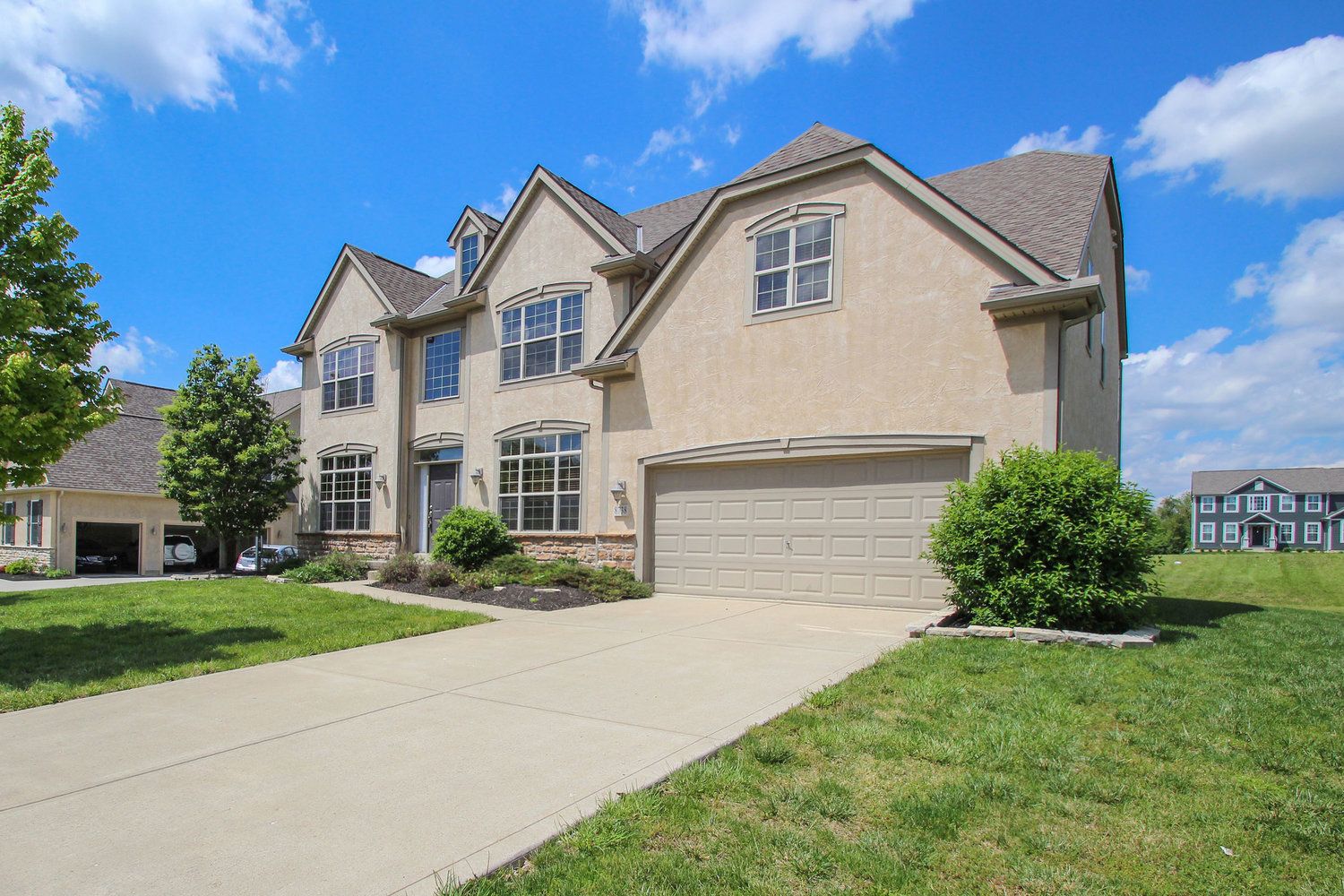 High-quality listing photo of residential home exterior with strong curb appeal