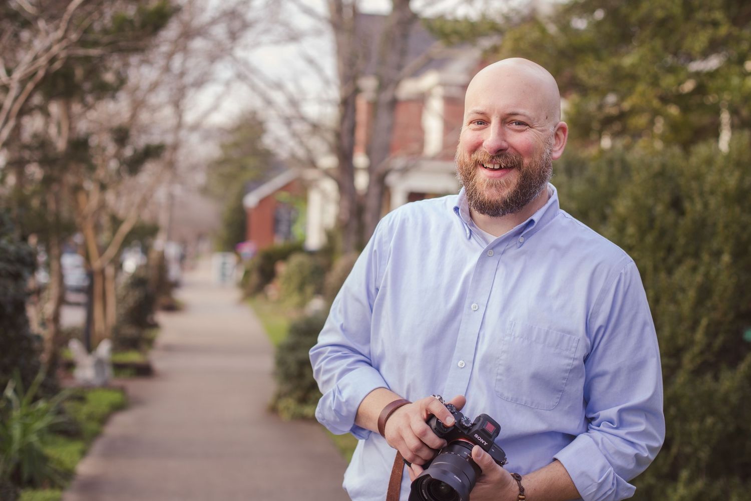 Luxury branding headshot for Nashville drone, videographer, photographer, timeless and professional warm, neutral tones.