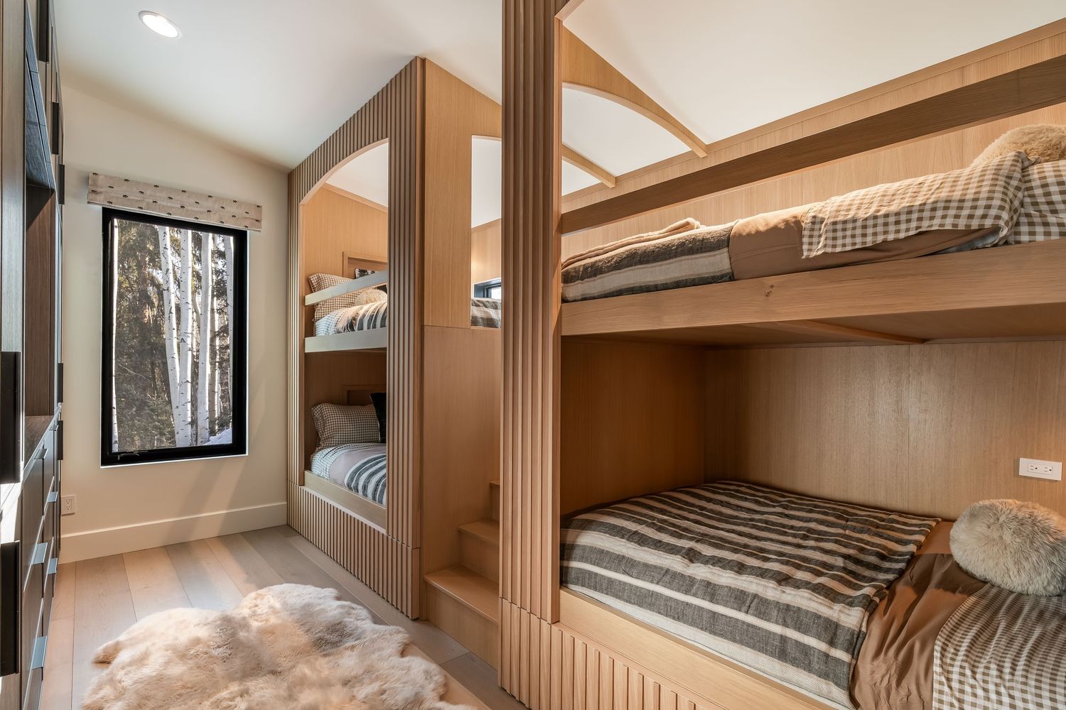 Modern RV interior collage showing bedroom, kitchen, and living spaces with warm wood finishes and neutral decor.