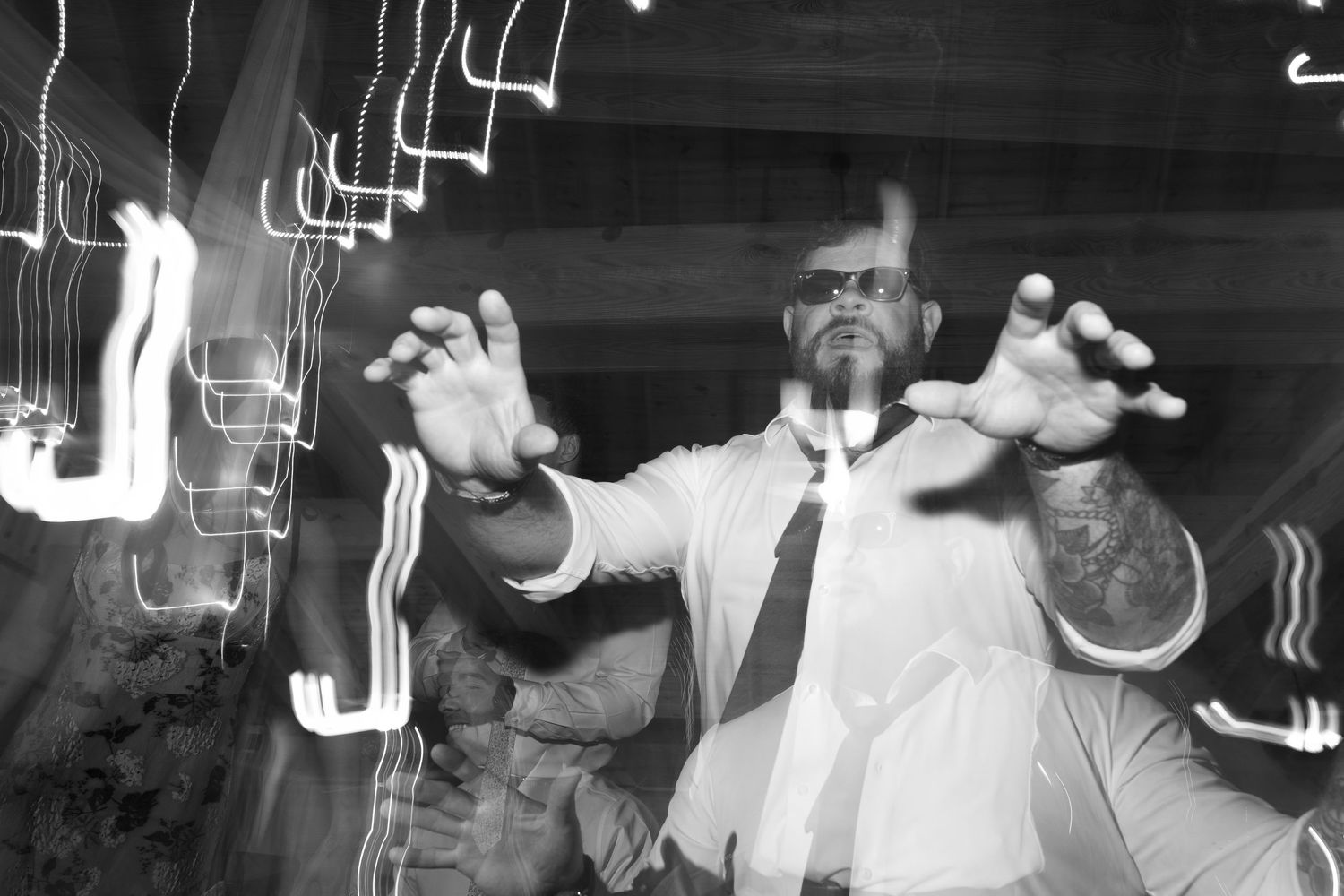 Energetic dance floor scene with motion blur and ambient lighting.