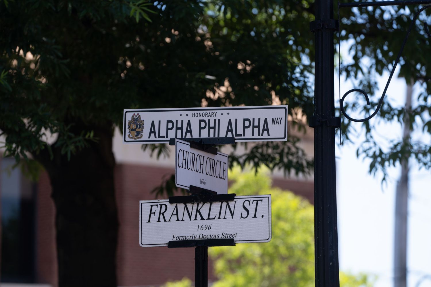 Street sign showing intersection of Alpha Phi Alpha and Franklin Street.