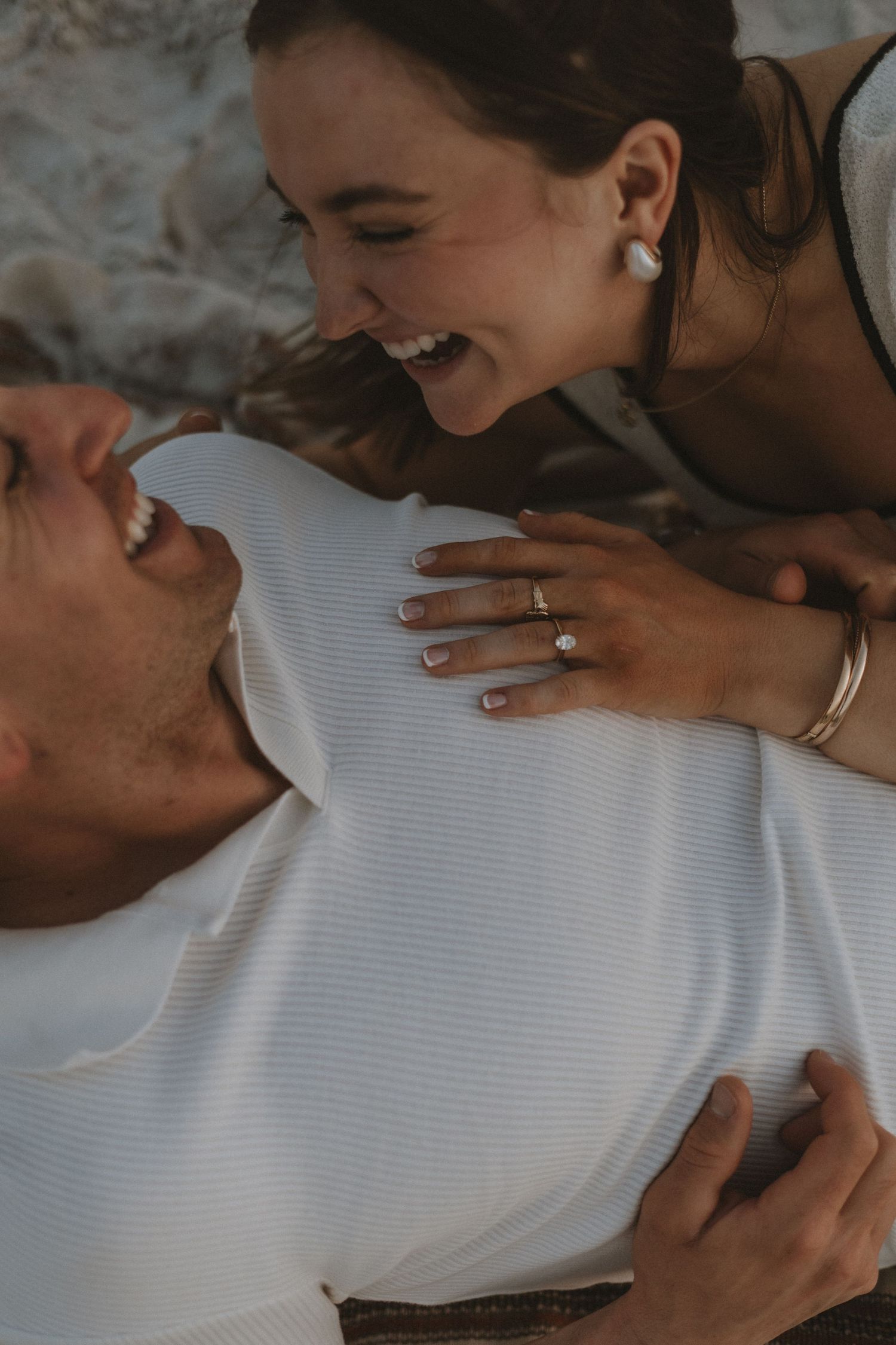 Intimate close-up portrait capturing tender moment between couple in natural light.