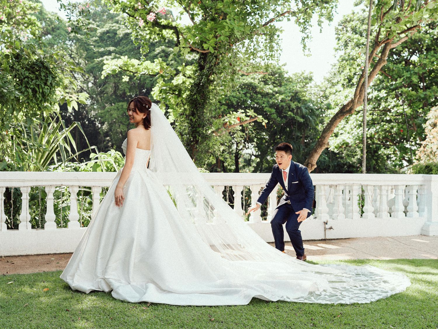 A romantic wedding photoshoot sequence in a lush garden setting with a flowing white gown and elegant poses.