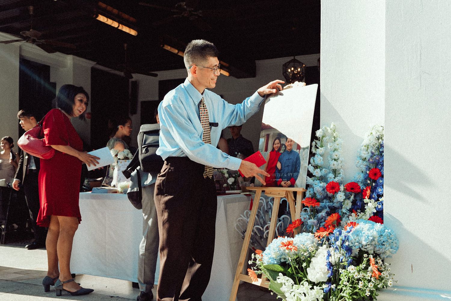 A series of candid reception photos showing people dancing and socializing at an indoor wedding celebration.