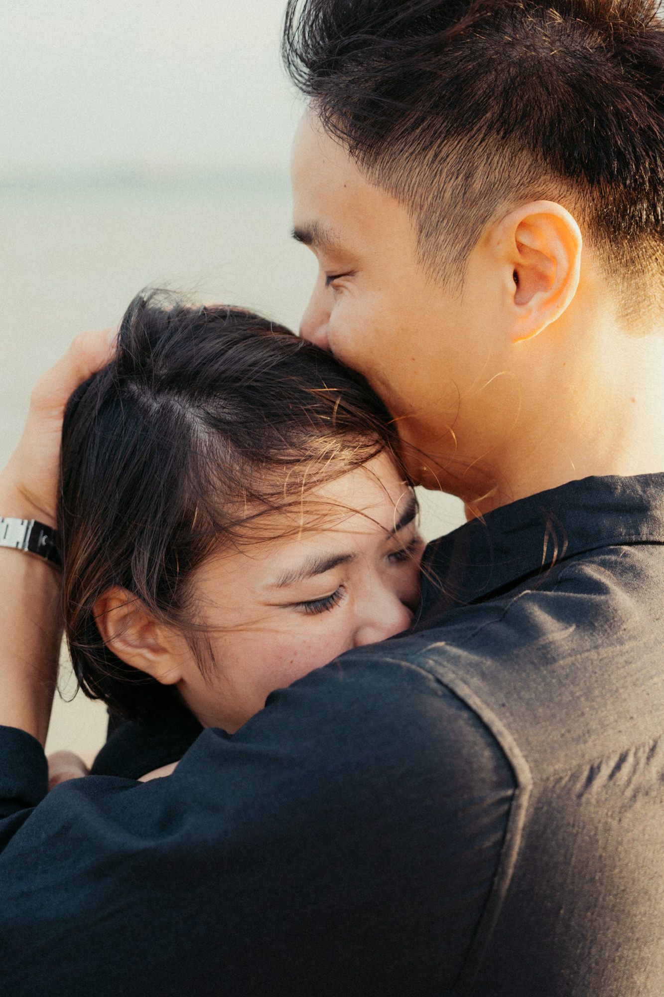 An intimate close-up of a couple sharing a tender moment together.