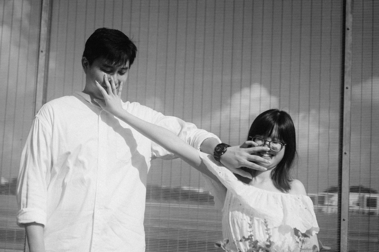 A black and white photo sequence shows a couple dancing together in a romantic embrace.