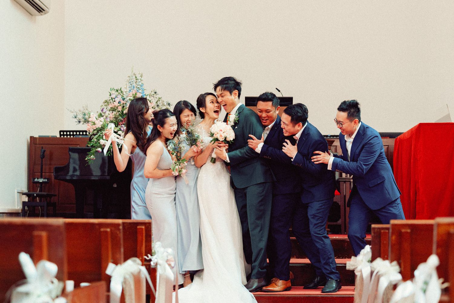 Wedding ceremony moments captured inside traditional church sanctuary with guests.