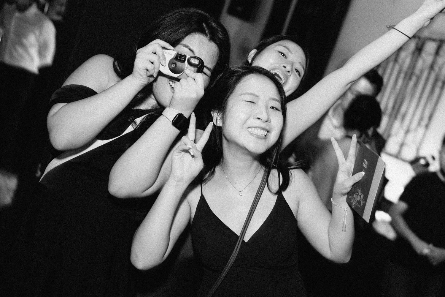 Black and white photo sequence showing people dancing and enjoying music at a party or nightclub event.