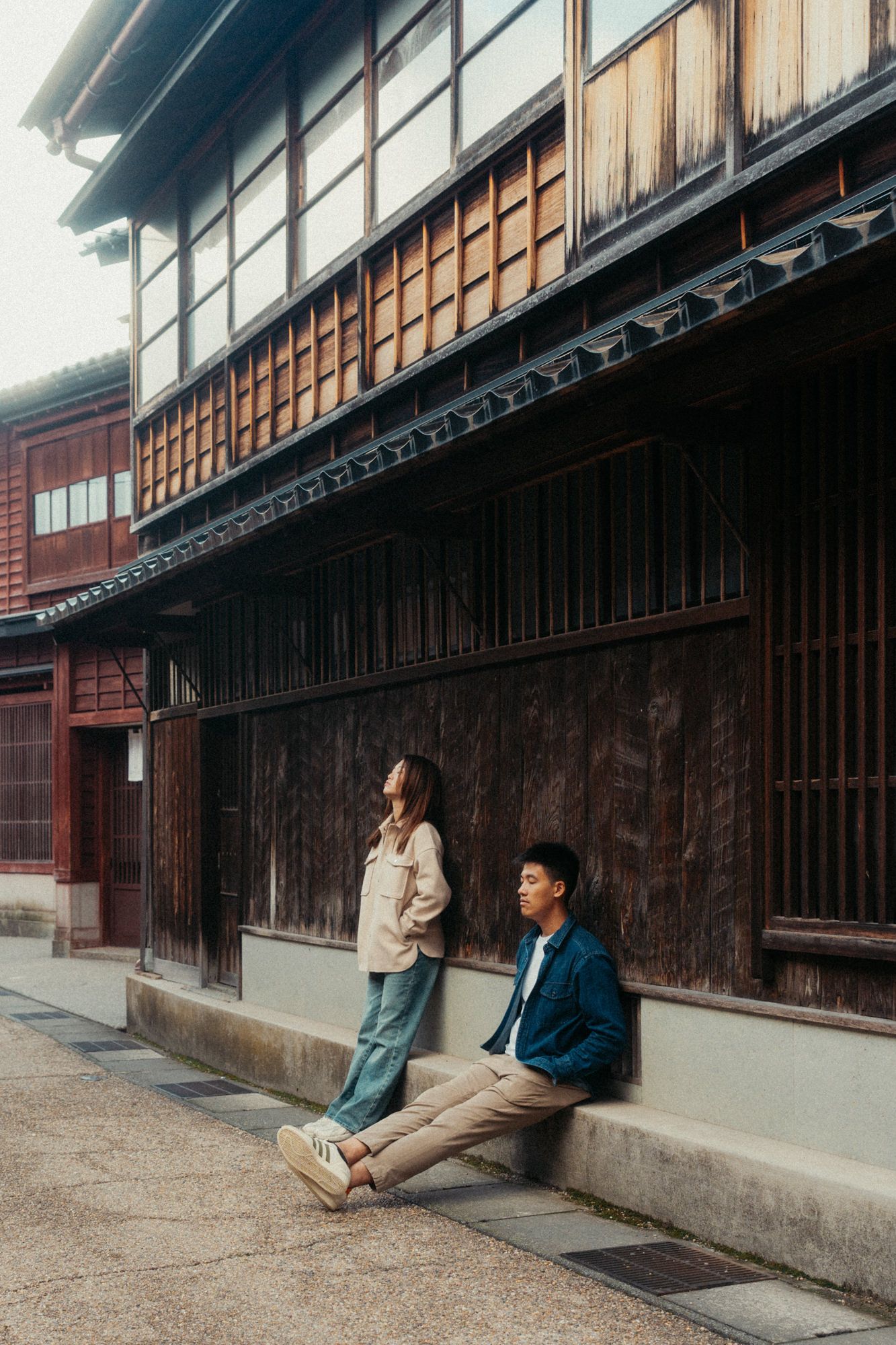 Traditional wooden Japanese architecture with dark timber facades and overhanging eaves.