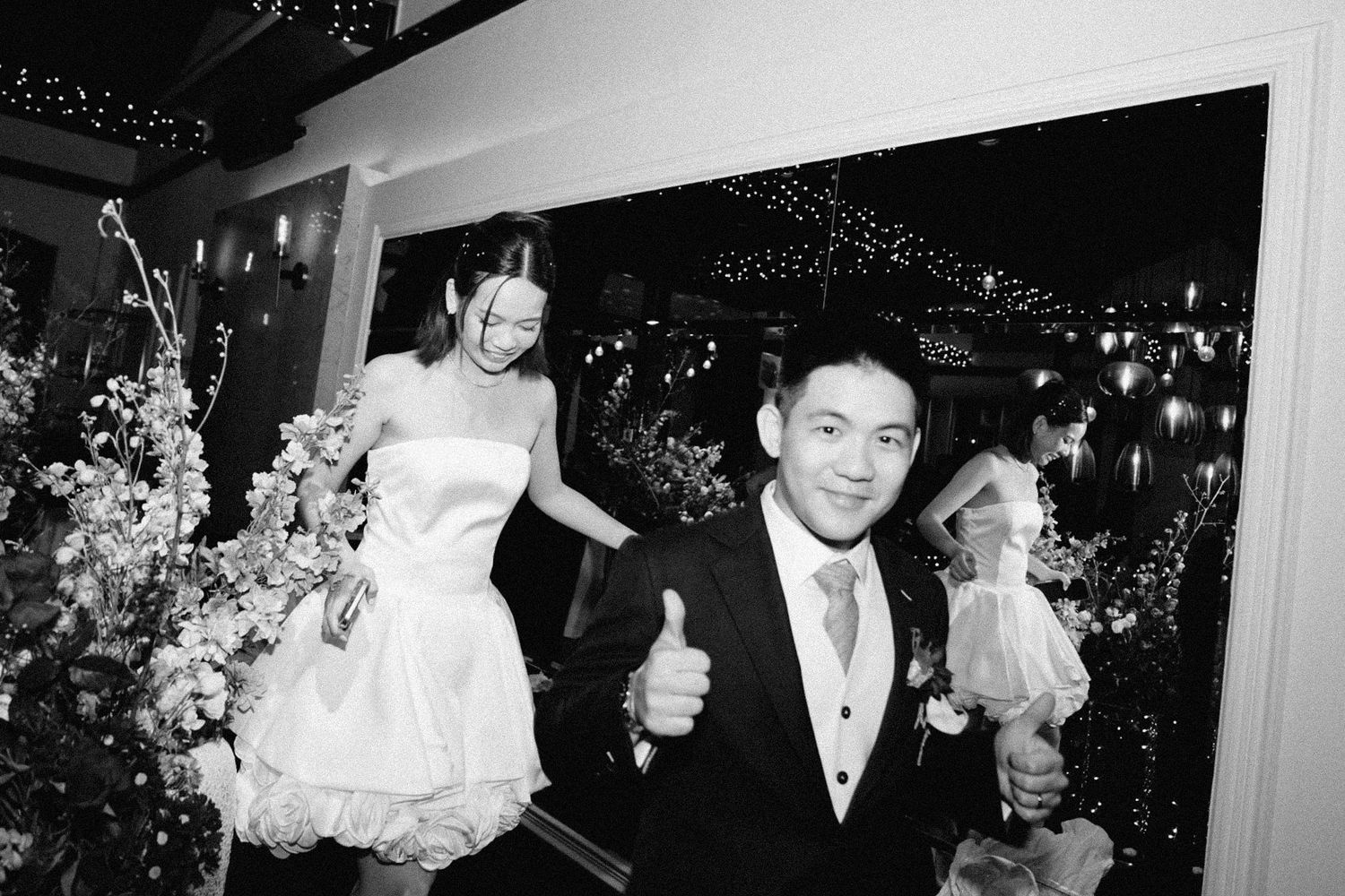 A black and white collage of wedding celebration moments showing dancing and festivities at a reception.