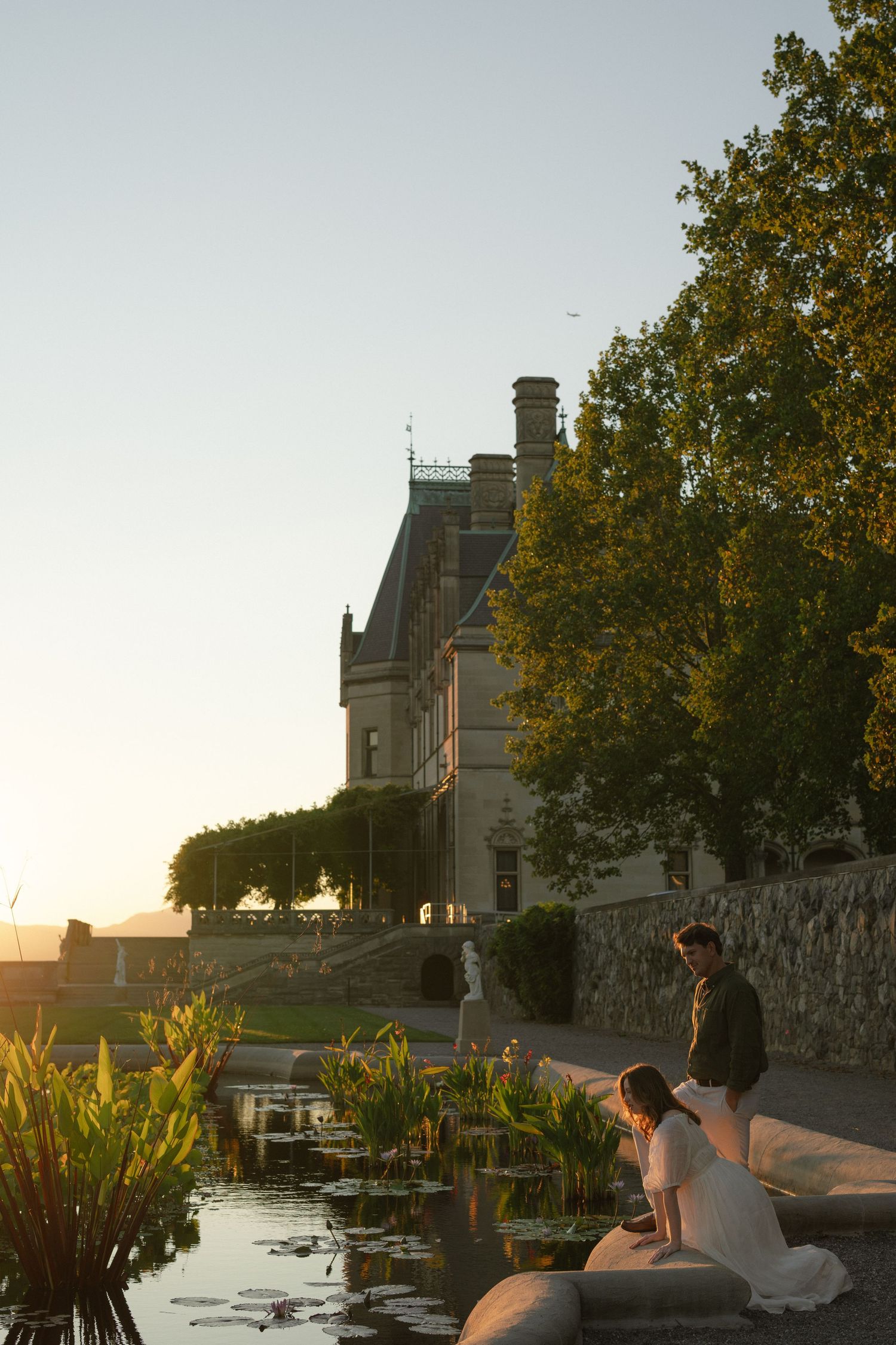 Scenic waterfront photoshoot during golden hour sunset.