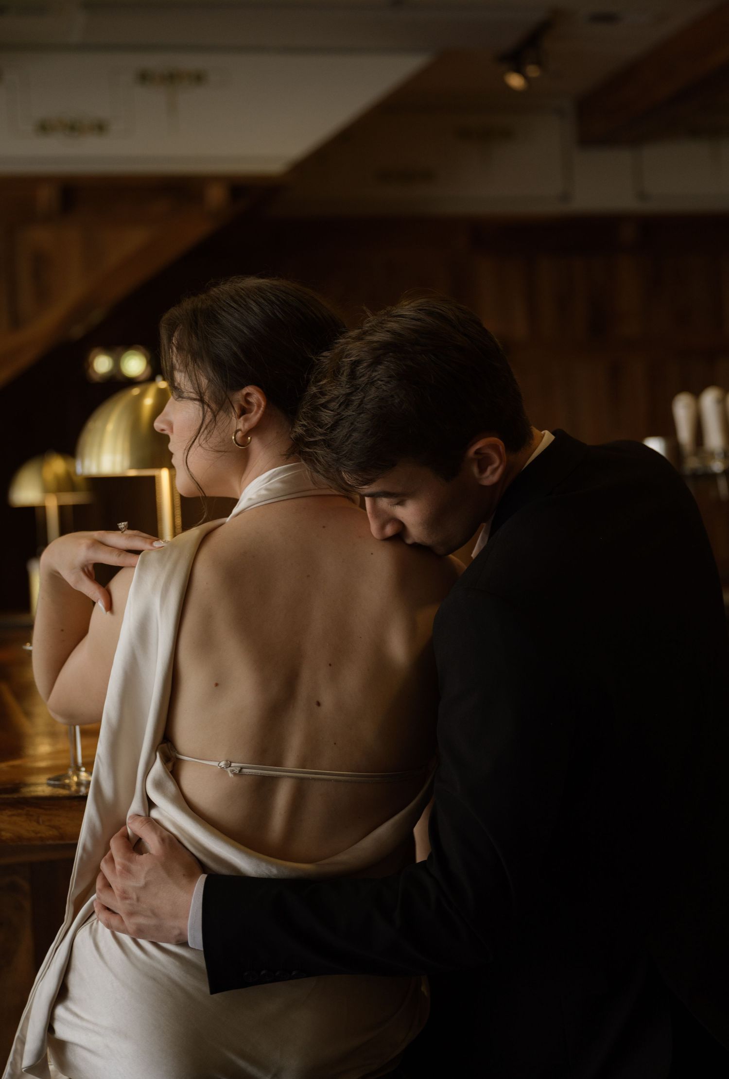 Intimate low-light portrait sequence with dramatic shadows and warm ambient lighting.