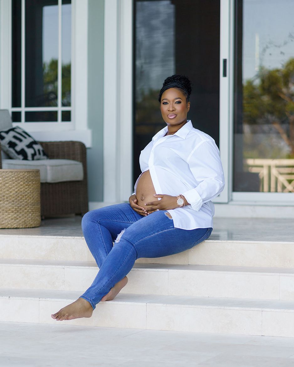 Elegant maternity portrait on outdoor steps