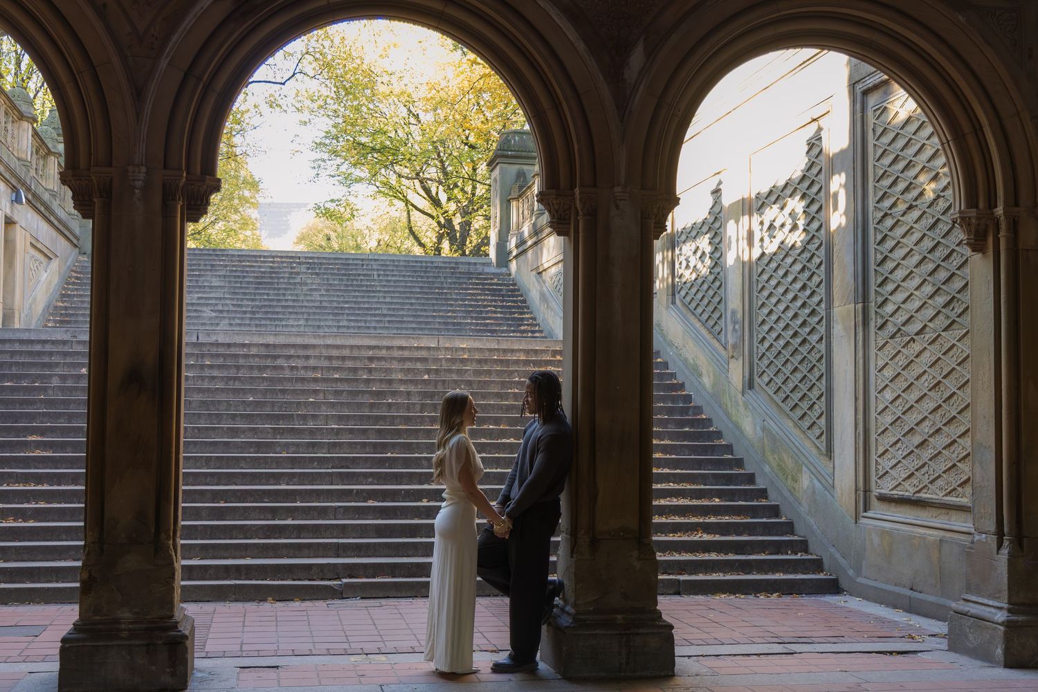 Couple photoshoot under the Bethesda Terrace Arches.