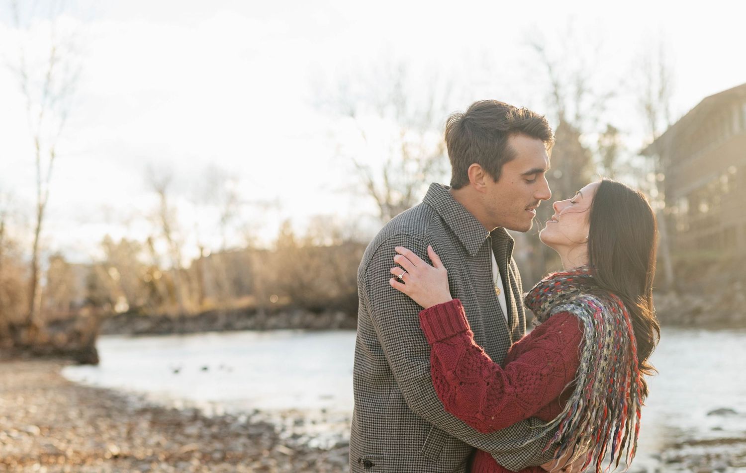 A romantic couple shares tender moments in various outdoor settings during sunset.