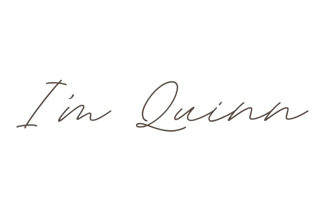 Elegant handwritten signature or text in flowing cursive style.