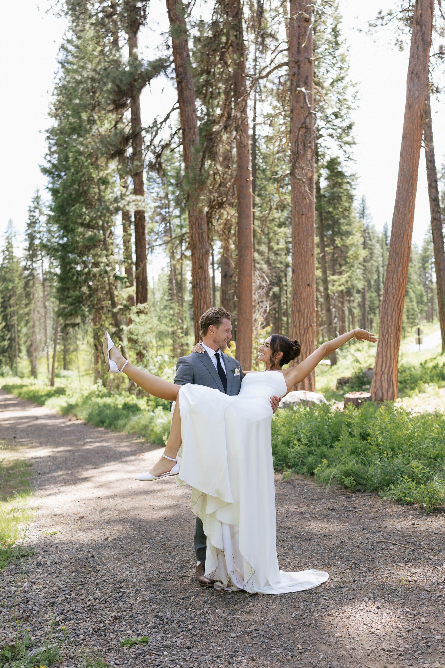 A wedding photo sequence in a pine forest with a bride in white dress making sweeping movements.