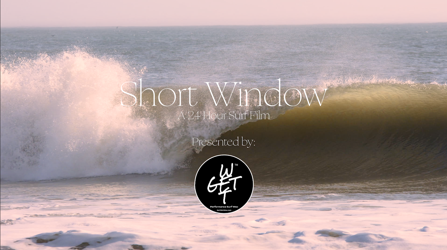 Short Window surf film title card with crashing ocean wave and presenter logo overlay.