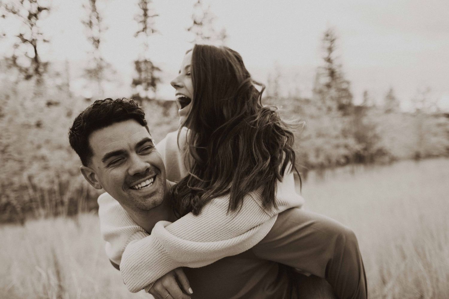 A candid moment captured during a romantic outdoor photo session.