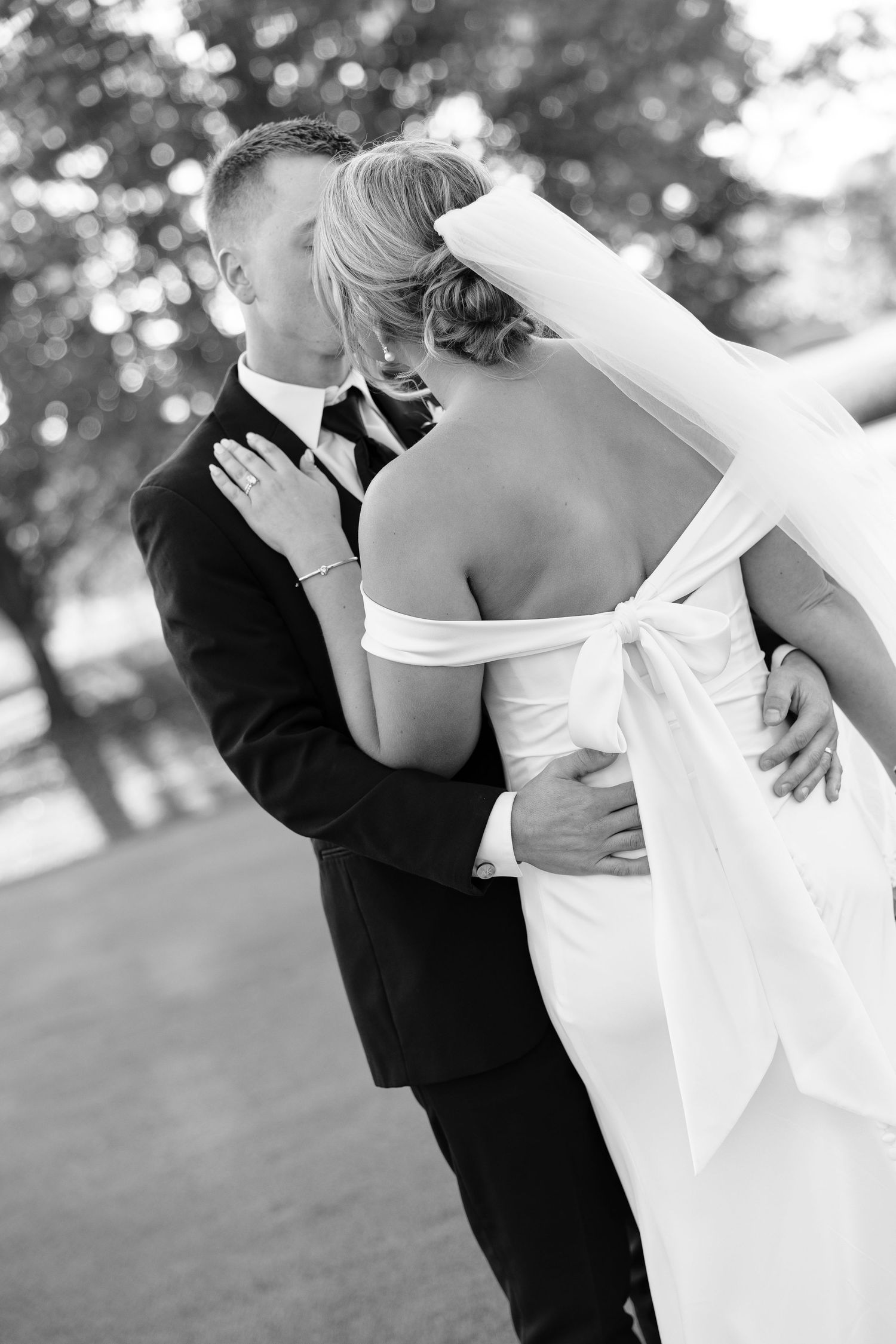 Black and white romantic dance sequence showing elegant movement in formal attire.