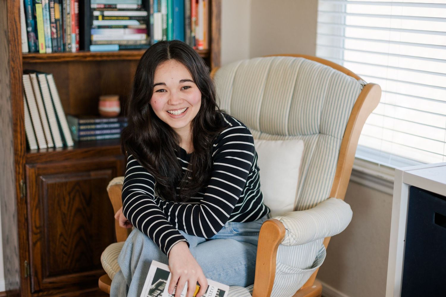 asian Japanese woman poses for headshots for author branding business photoshoot